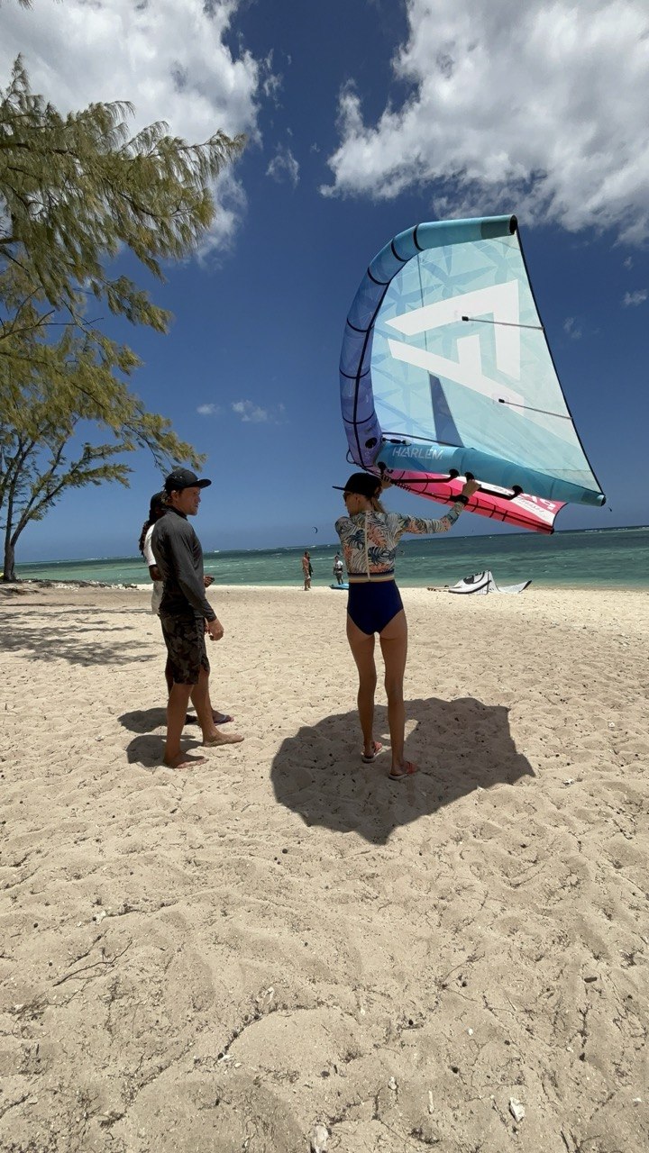 Instructor demonstrating safe wing control at Le Morne